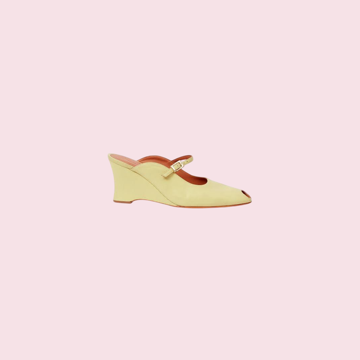 A butter-yellow mary-jane wedge, cut out in the app.